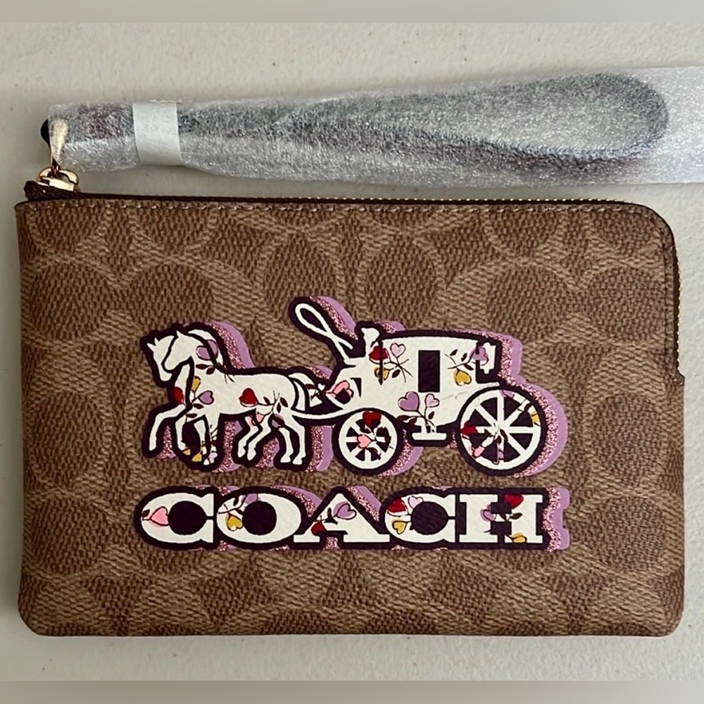 Coach Brown Wristlet with Pink and White Design
